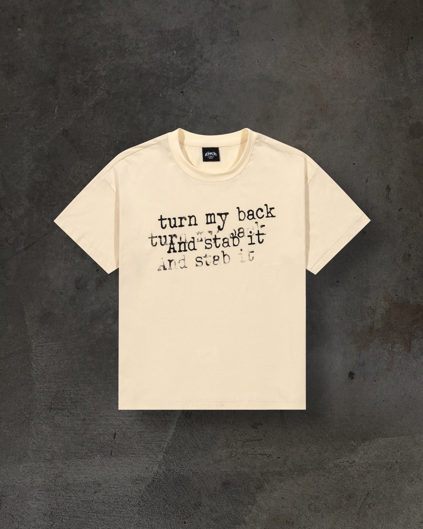 BACKSTAB TEE (CREME)