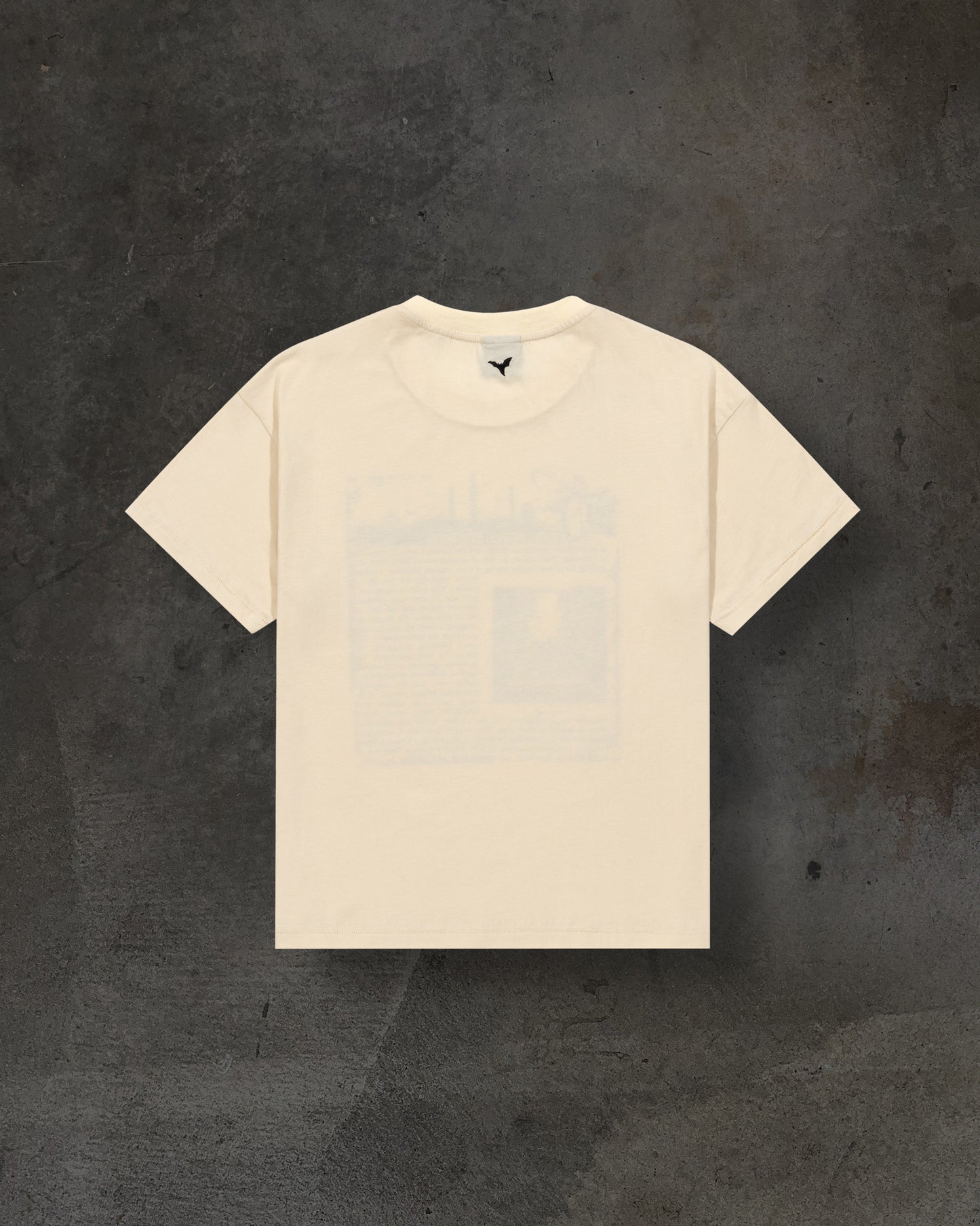 DEVASTATING NEWS TEE (CREME)