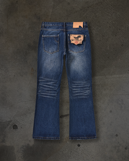 FLARED BOOTCUT COATED DENIM (WAXED BLUE)